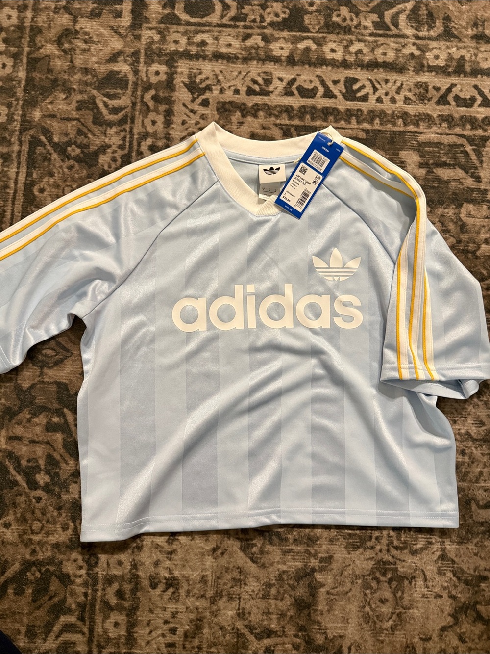 adidas youth L Light Blue Short Sleeve Logo Jersey with Yellow Stripes